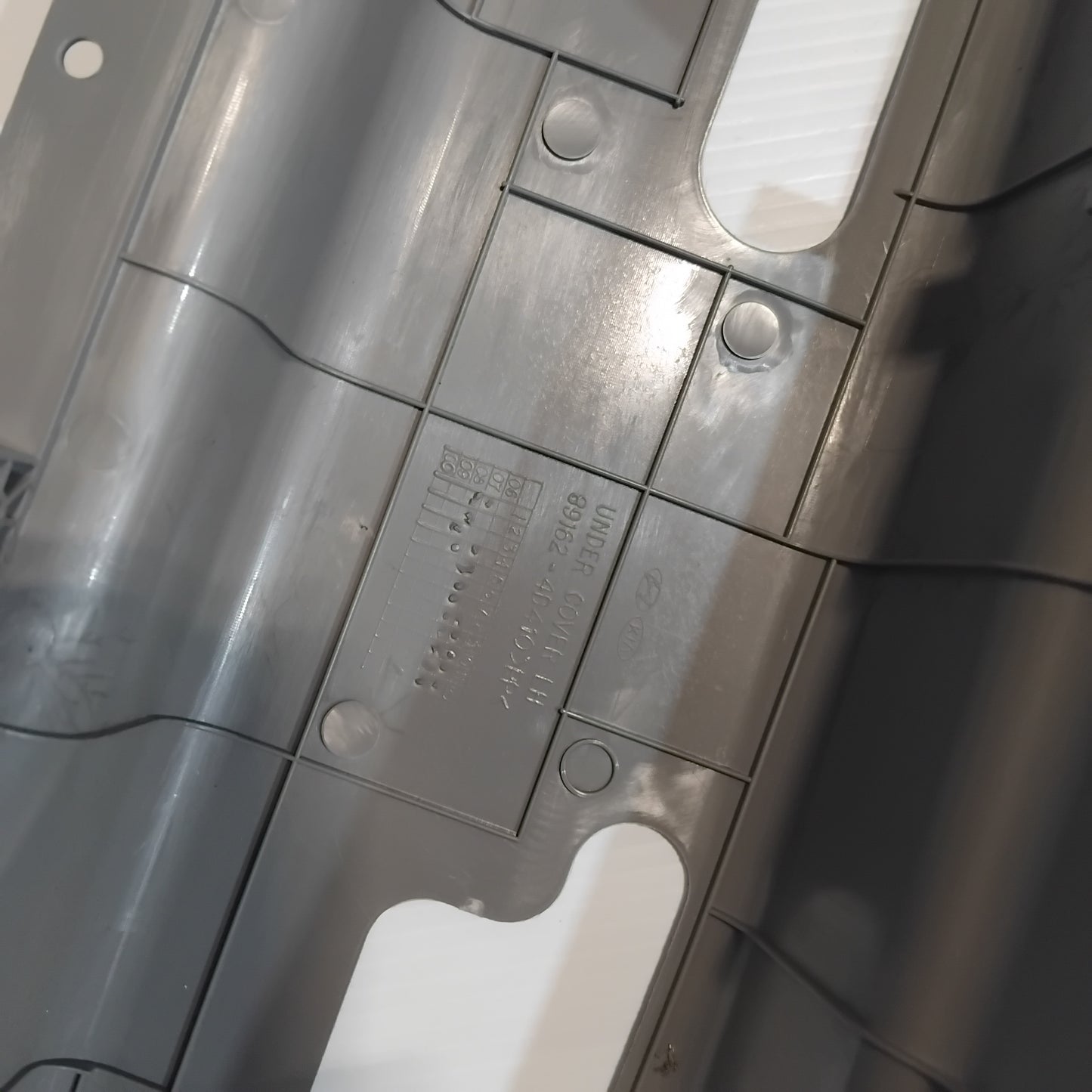 Genuine 3rd Row Left Seat Cushion Moulding - Kia Sedona 2006-2012 | 891624D410KS