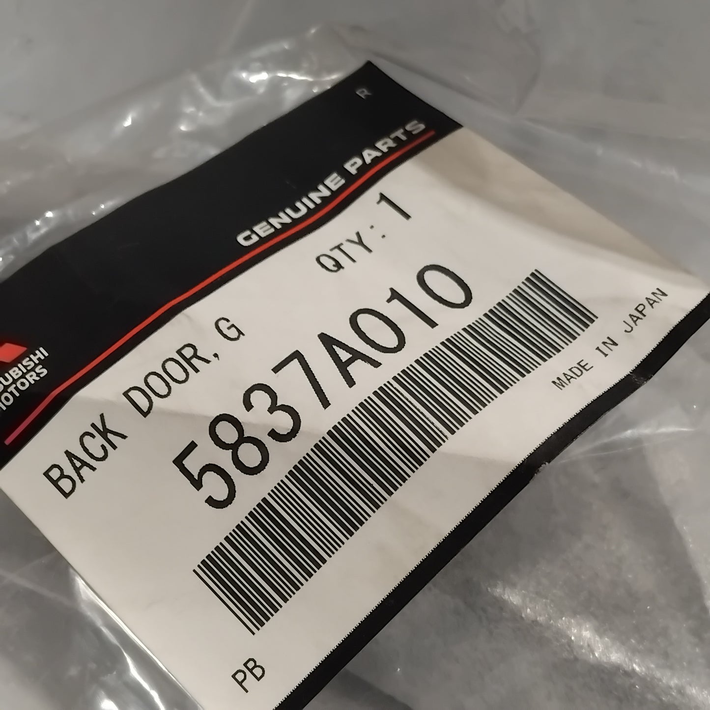 Genuine Mitsubishi Garnish,Back Door,Lwr Rh | 5837A010