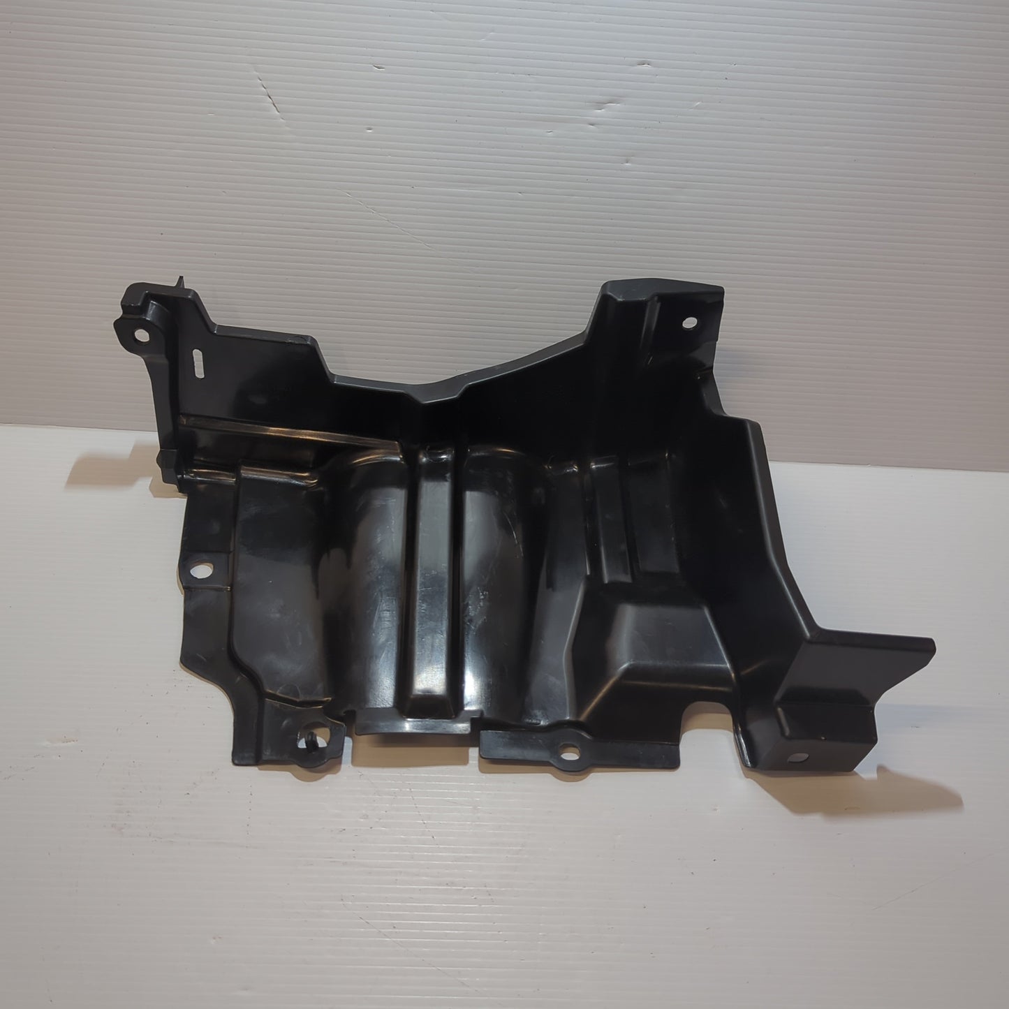 Genuine Front Bumper Left Splash Cover - Suzuki Celero | 71431-76M00-000
