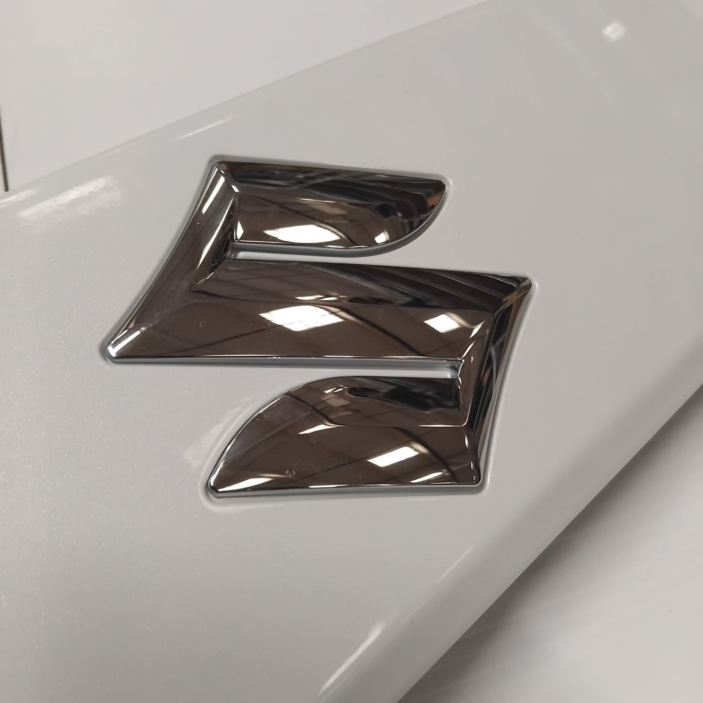 Genuine Boot Garnish White - Suzuki SX4 2013-2021 | 83940-61M00-ZNL