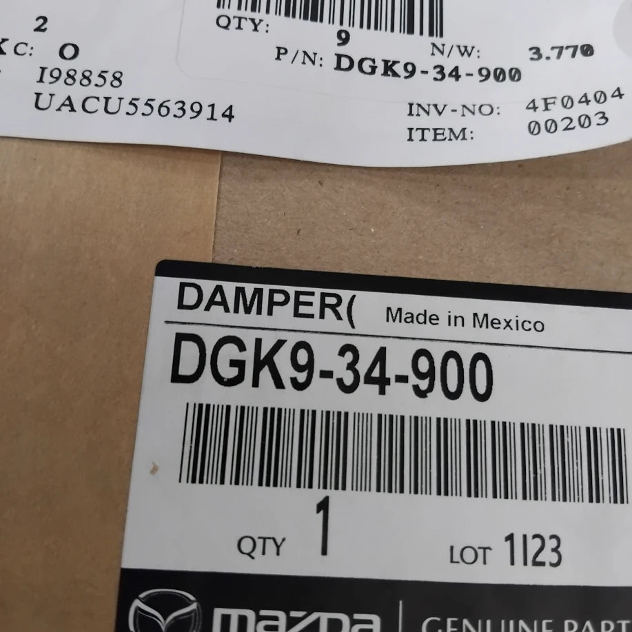 Genuine Mazda Damper(L),Front | DGK934900
