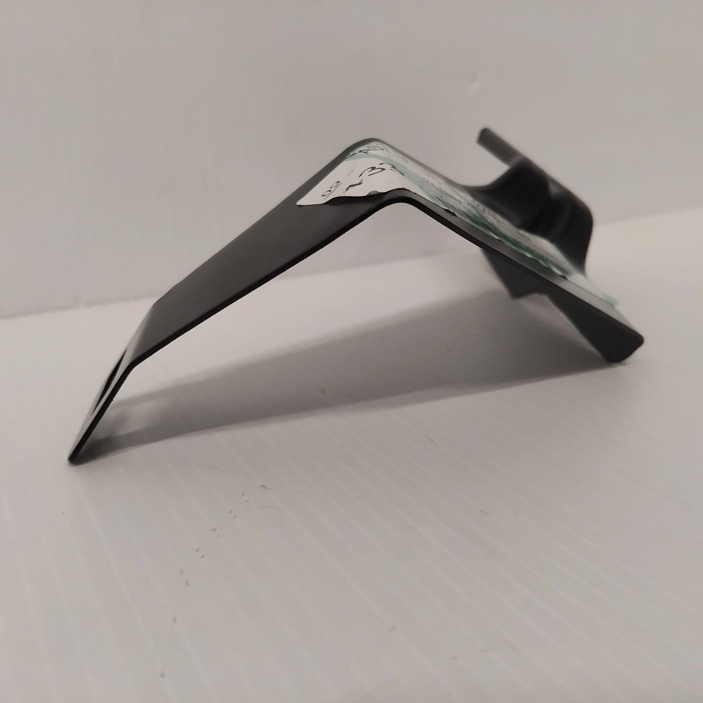 Genuine Front Grille Centre Bracket - Nissan Cabstar 2013-2019 | 62392LC60A