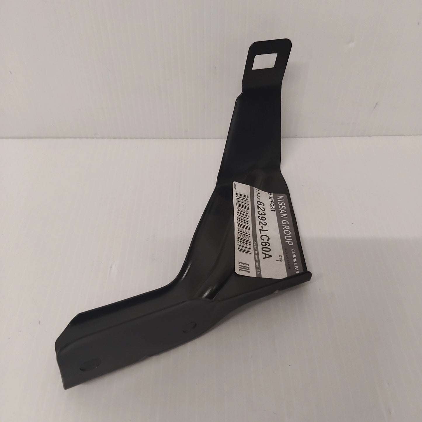 Genuine Front Grille Centre Bracket - Nissan Cabstar 2013-2019 | 62392LC60A