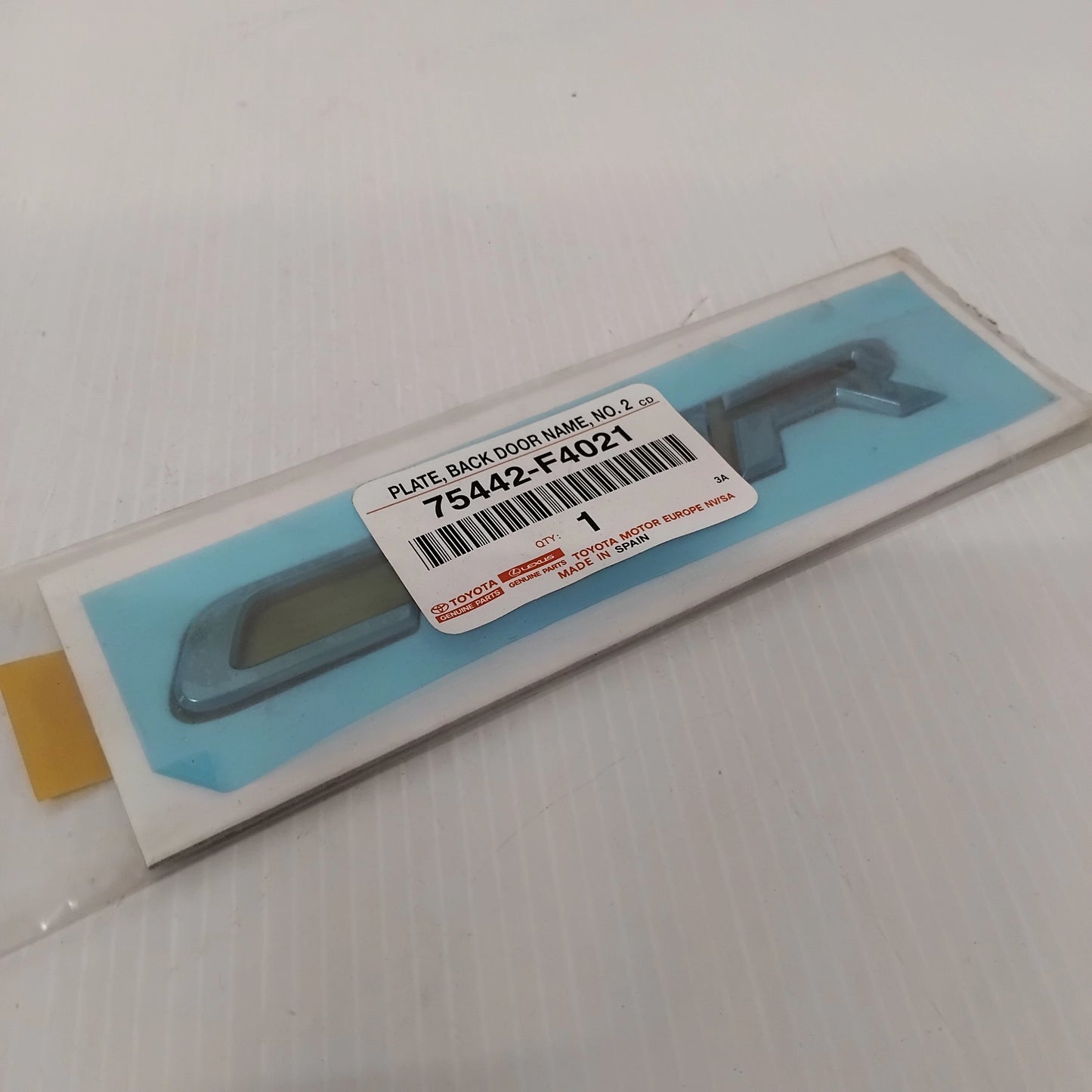 Genuine Toyota Plate, Back Door Nam | 75442-F4021