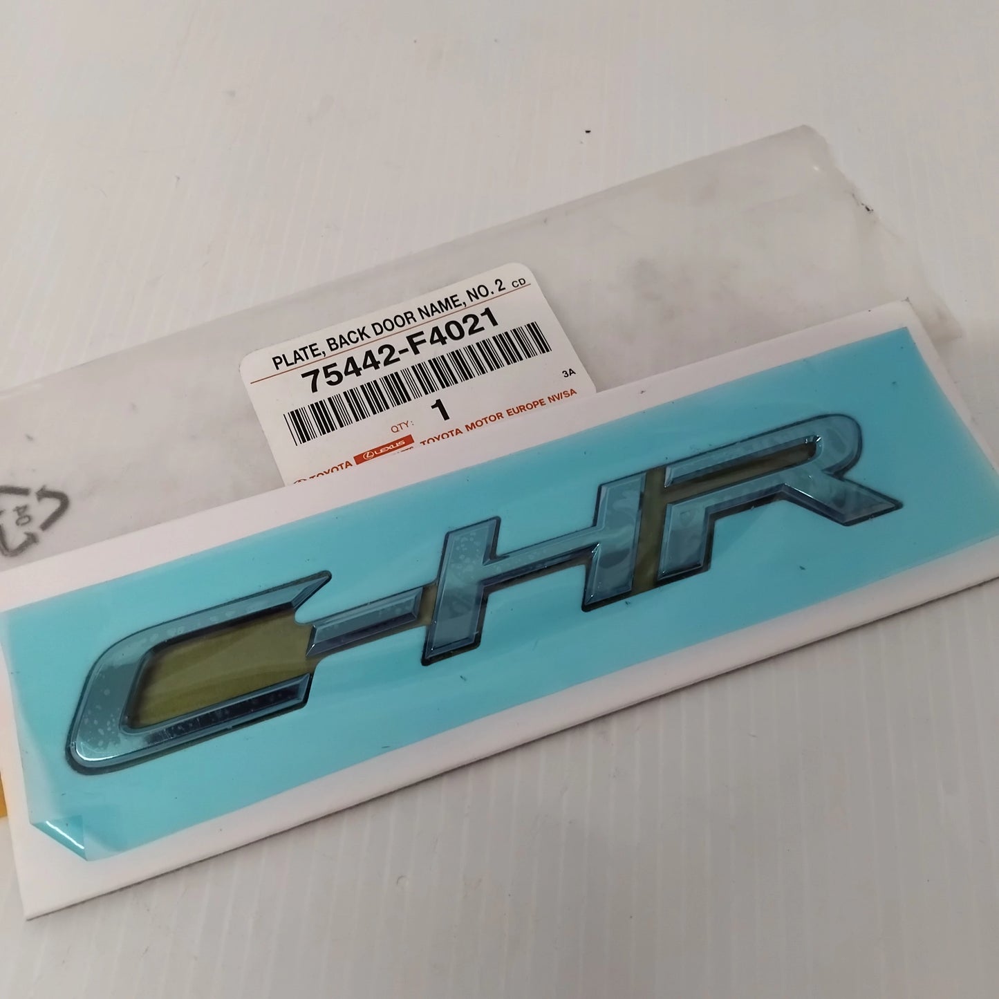 Genuine Toyota Plate, Back Door Nam | 75442-F4021