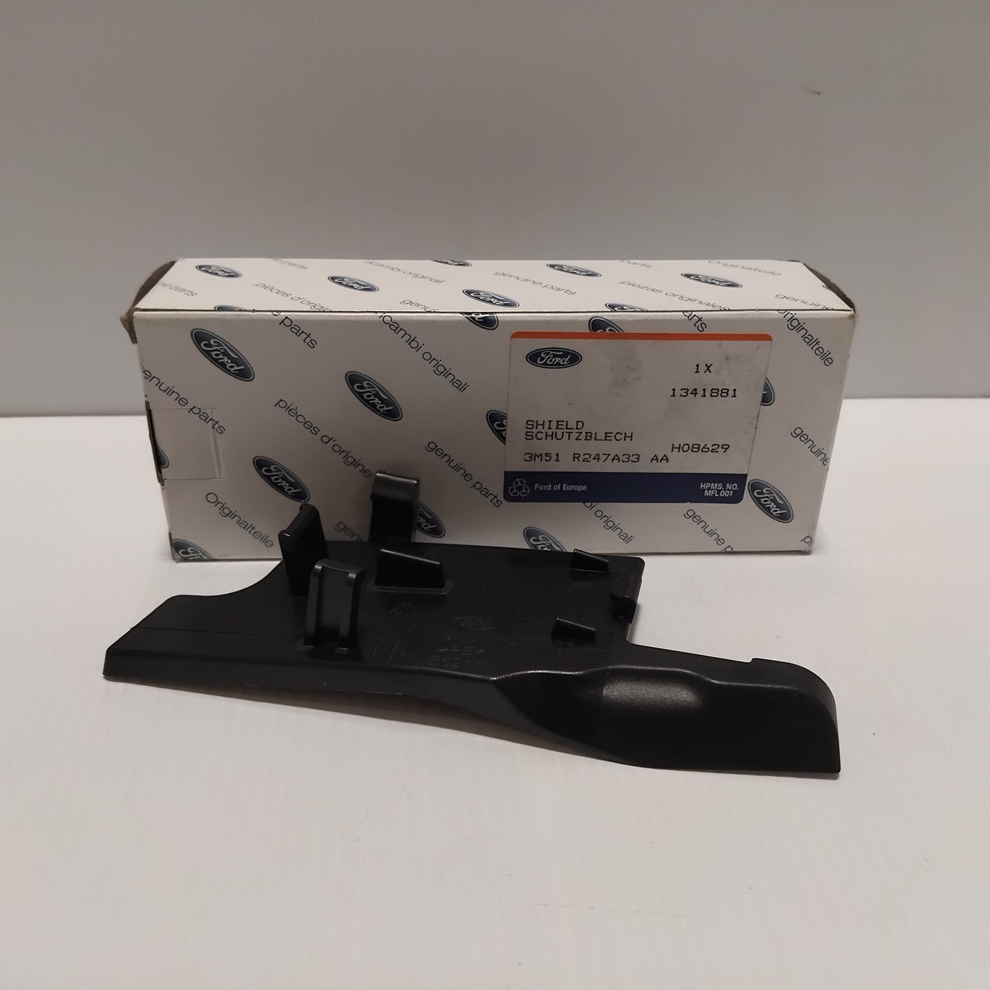 Genuine Left Rear Door Handle Bracket Shield - Ford Focus 2004-2011 | 1341881
