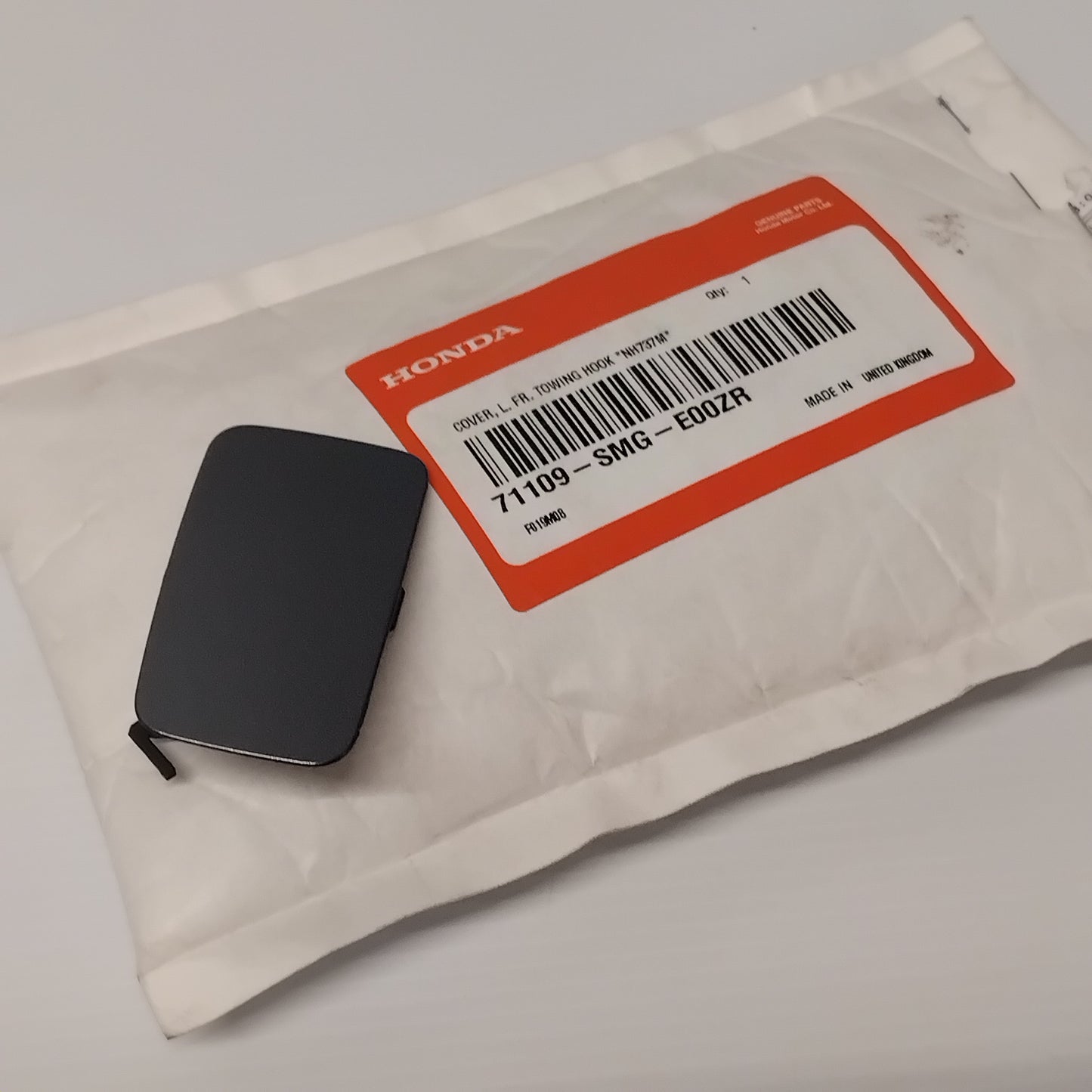 Genuine Honda Cover, L. Fr. Towing Hook | 71109SMGE00ZR