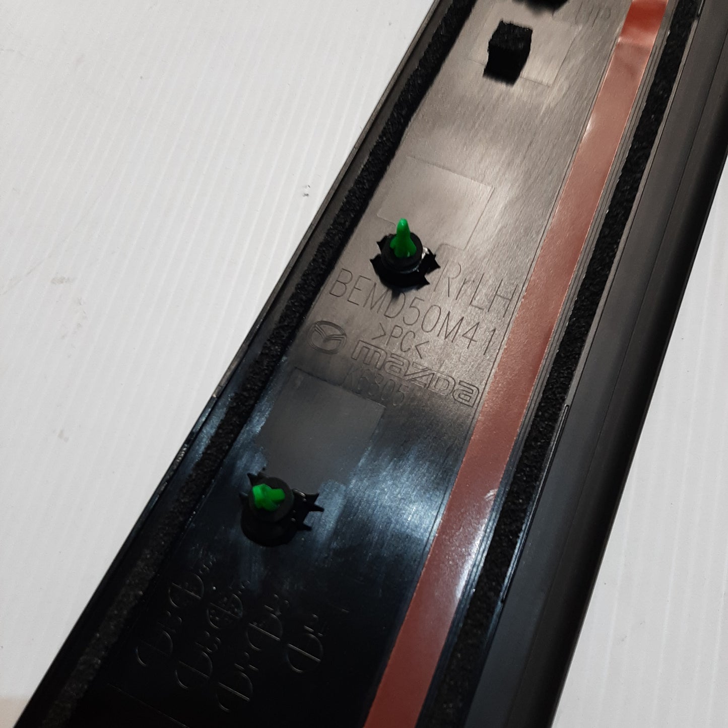 Genuine Mazda Garnish(L),Rear | BEMD50M40C