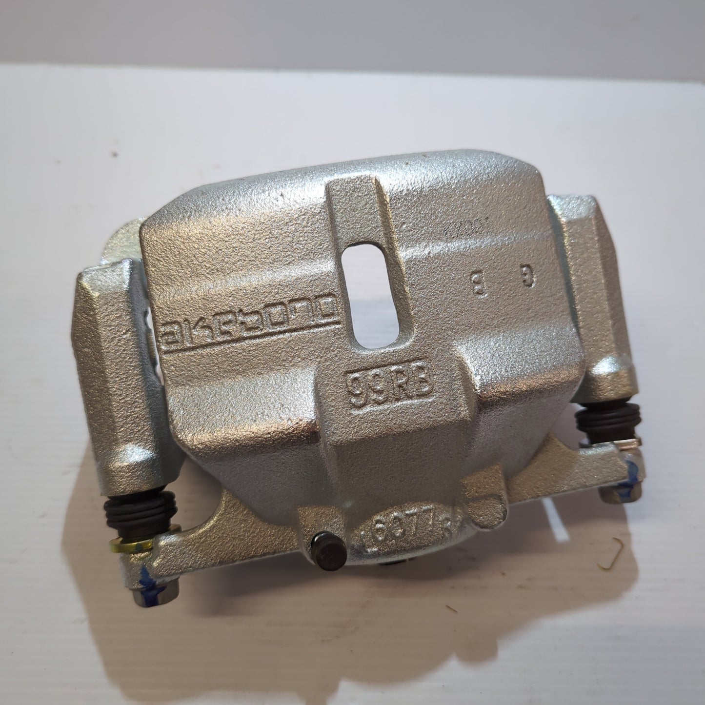 Genuine Front Left Brake Caliper - Nissan | 410114BA0C