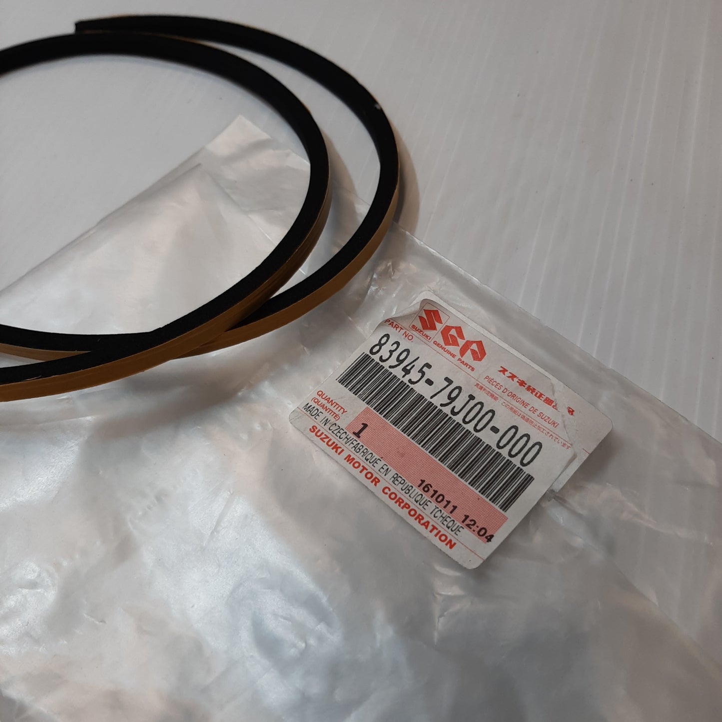 Genuine Back Door Garnish Pad - Suzuki | 83945-79J00-000