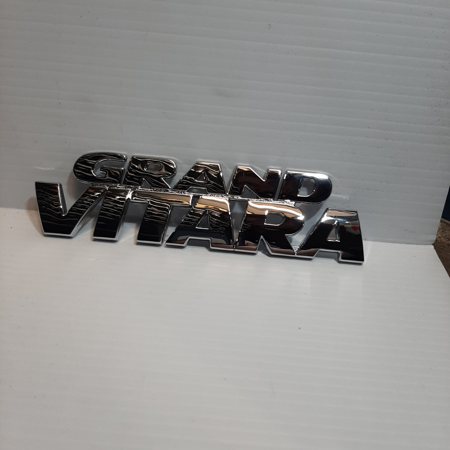 Genuine Emblem Grand Vitara - Suzuki Grand Vitara | 77841-65D21-0PG