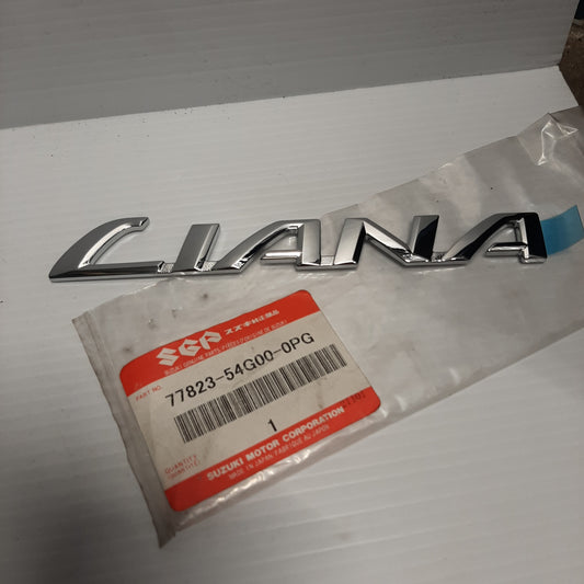 Genuine Suzuki Emblem (Liana) | 77823-54G00-0PG